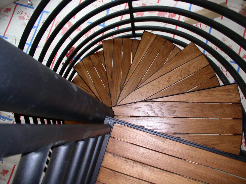 8 Line Deco Spiral Stair with Angle Frame Treads and Composite Treads 