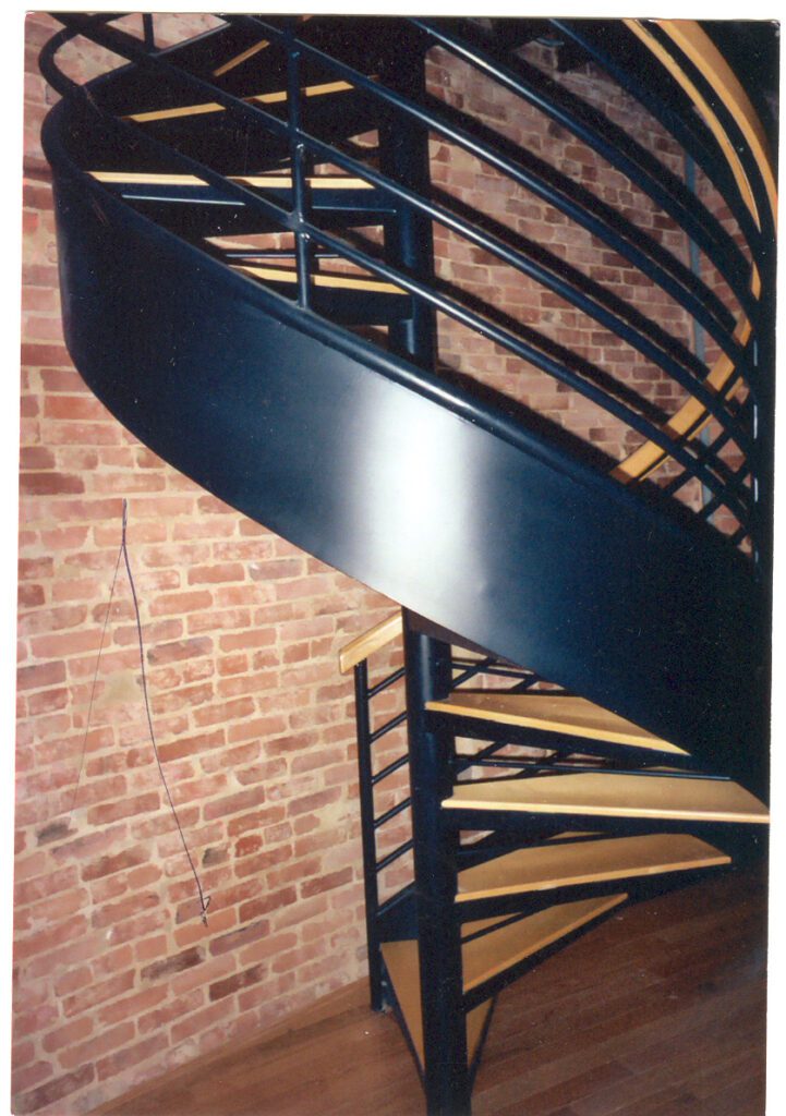 Spiral Stair with Wood Accents and Flat Plate Stringer 